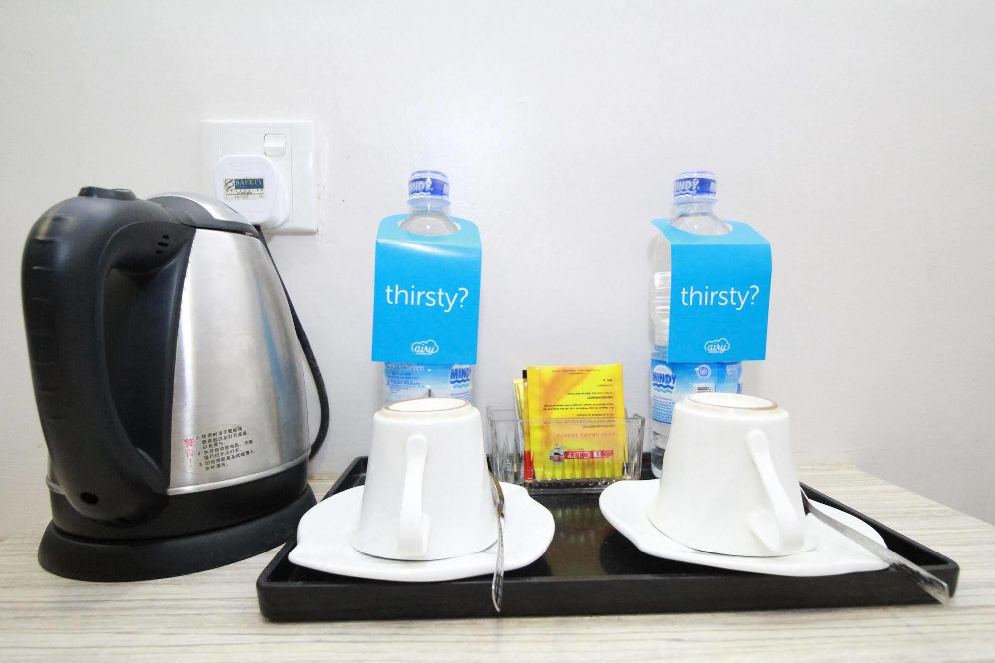 Hotel Airy Center Rezeki Graha Mas 12