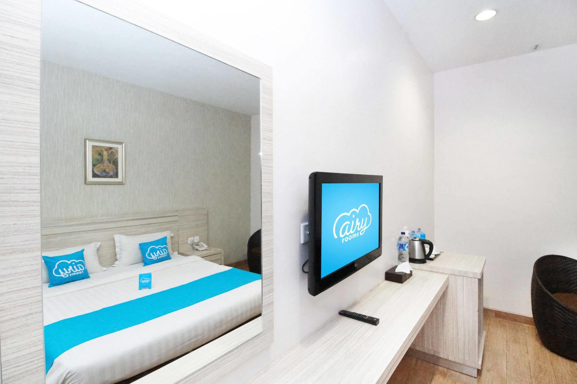 Hotel Airy Center Rezeki Graha Mas 12